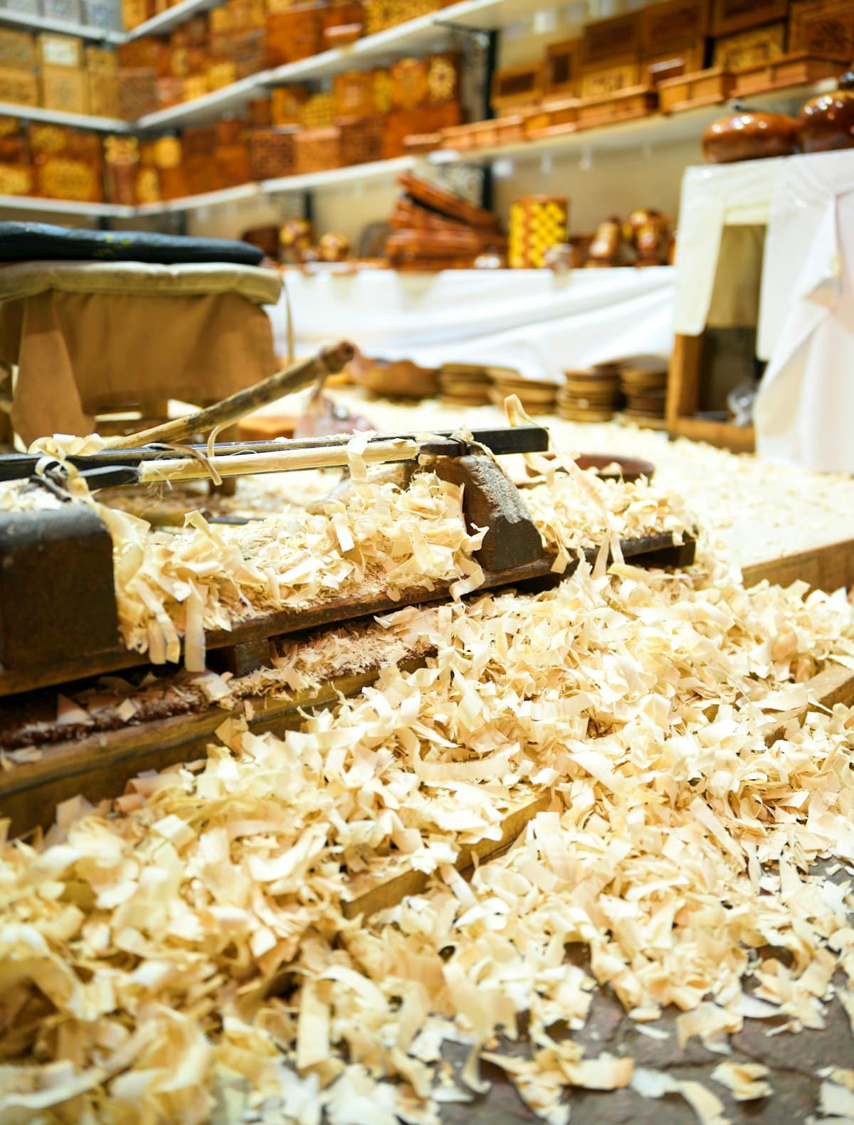 Hand tools and shavings on a workbench